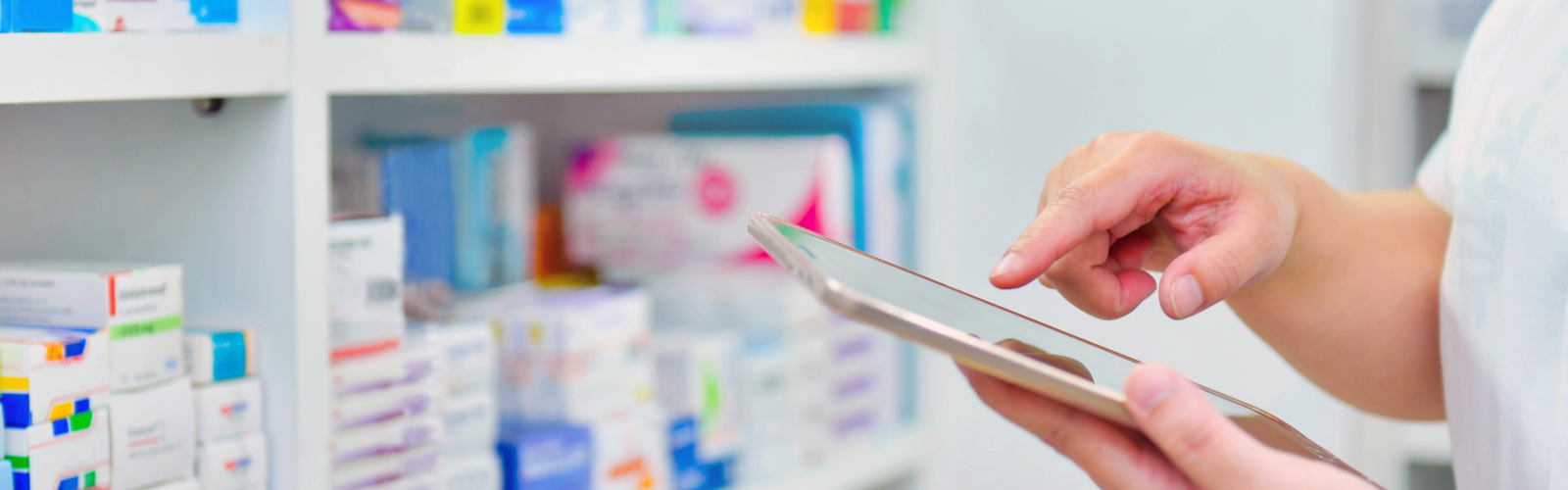 Specialty pharmacist tracking inventory with a computer tablet